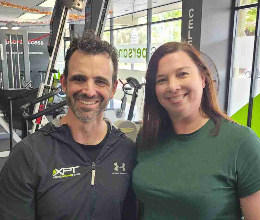 Anton and happy customer at Xpress Personal Training